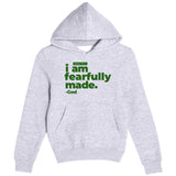 Gray hoodie with green text 'I am fearfully made. God' on a white background